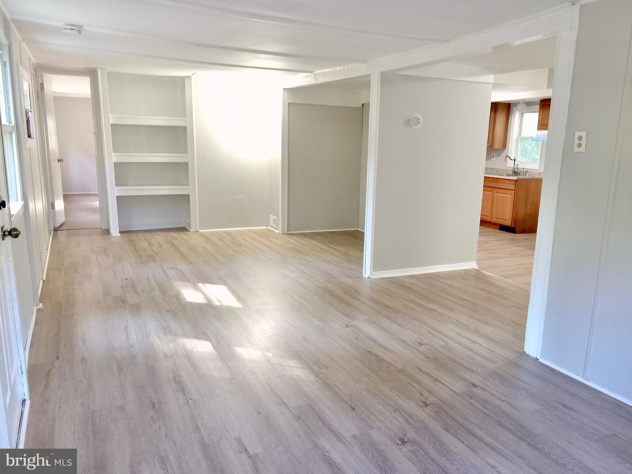 1761 Spring Garden Road Millville, NJ 08332 - Photo 7 of 14 a view of empty room with wooden floor