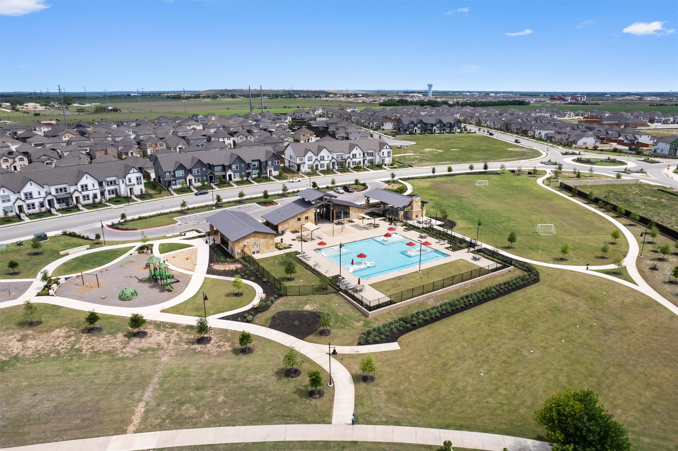 104 Stinchcomb Road Hutto, TX 78634 - Photo 40 of 40 Located within walking distance of Emory Crossing’s amenities, including trails, clubhouse, pool, park, and soccer fields.
