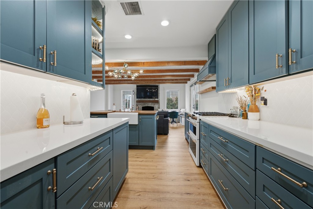 5559 East Monlaco Road Long Beach, CA 90808 - Photo 13 of 54 Lots of Cabinets and Quartz Counters!