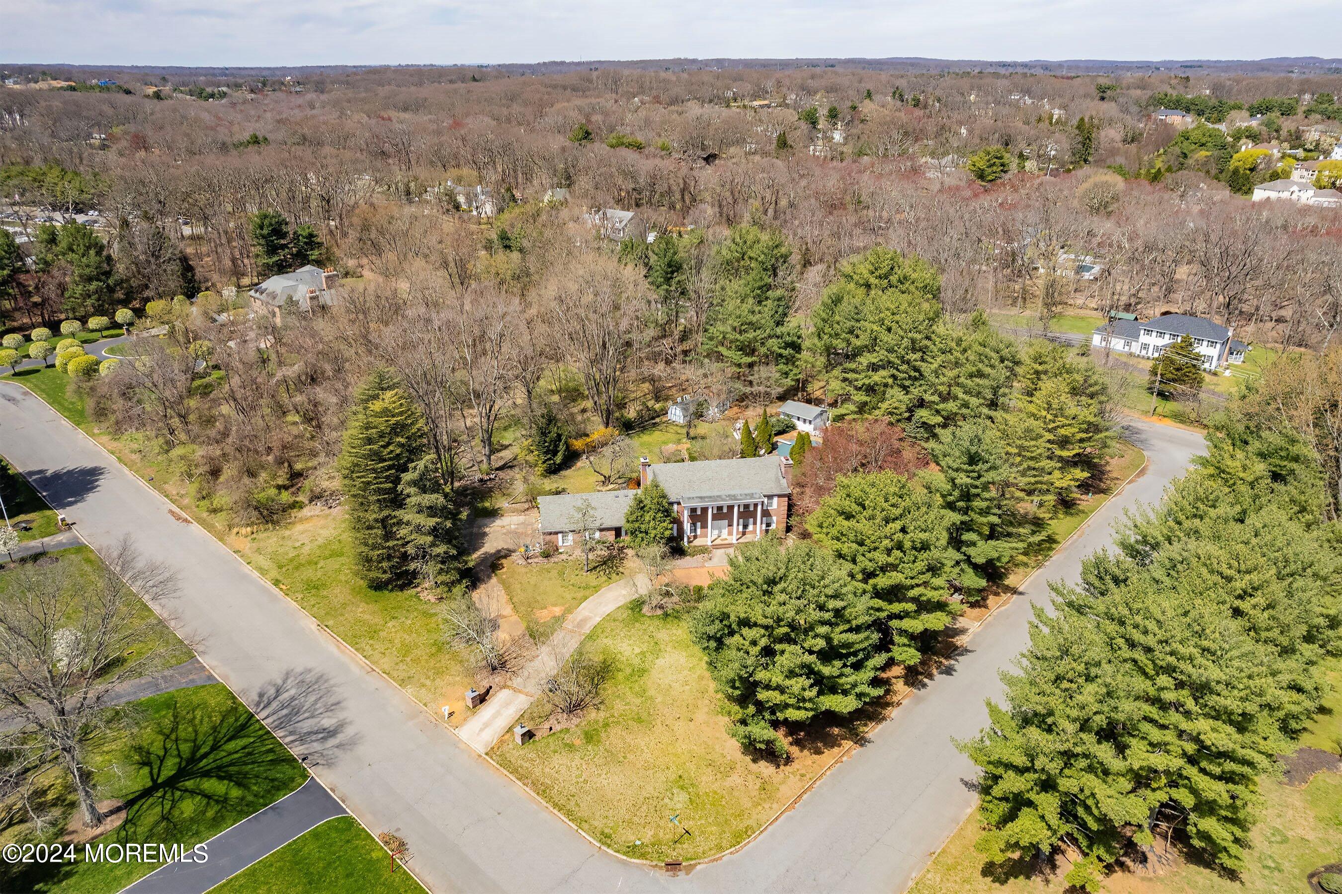 14 Deerpath Lane Colts Neck, NJ 07722 - Photo 2 of 32 an aerial view of residential houses with outdoor space