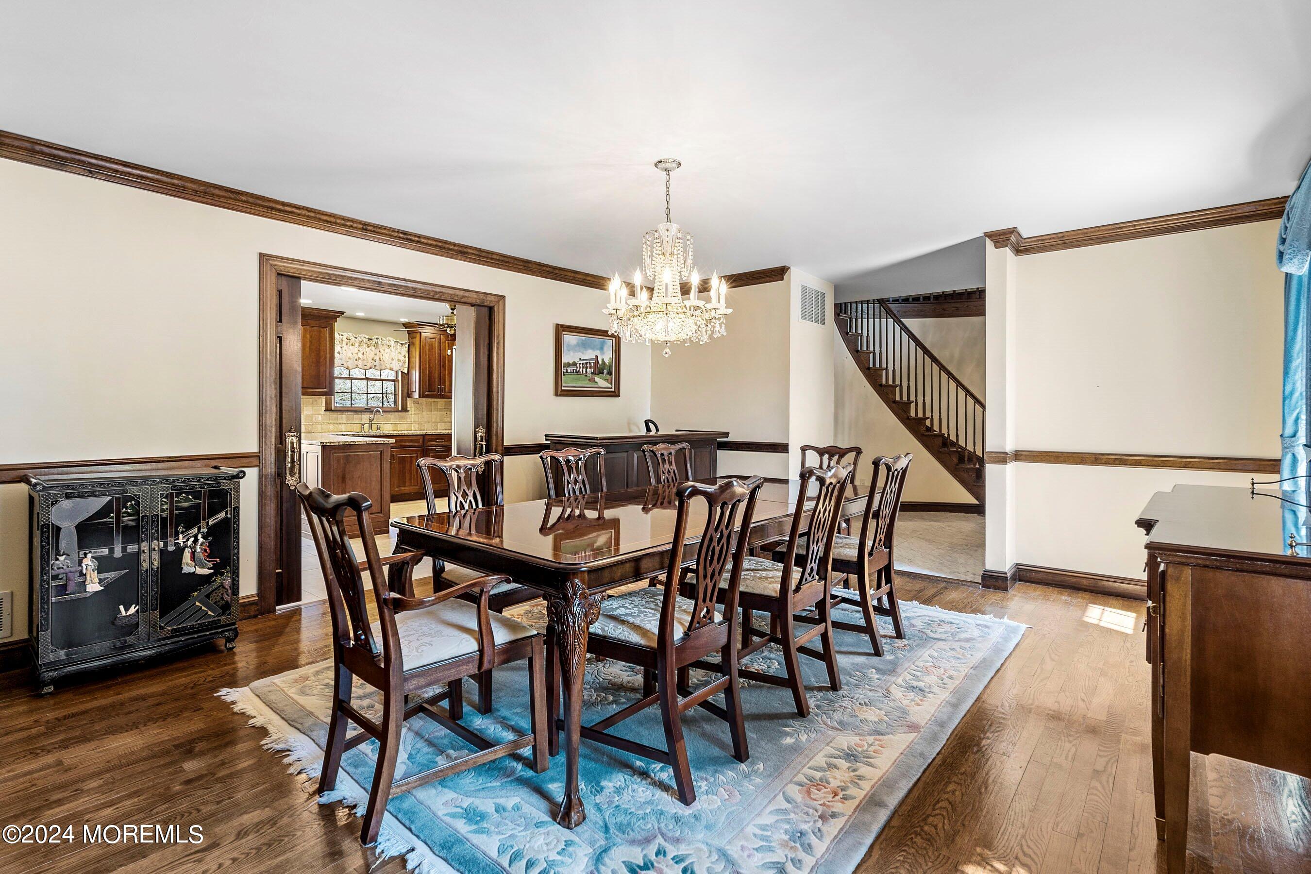 14 Deerpath Lane Colts Neck, NJ 07722 - Photo 8 of 32 a view of a dining room with furniture window and wooden floor