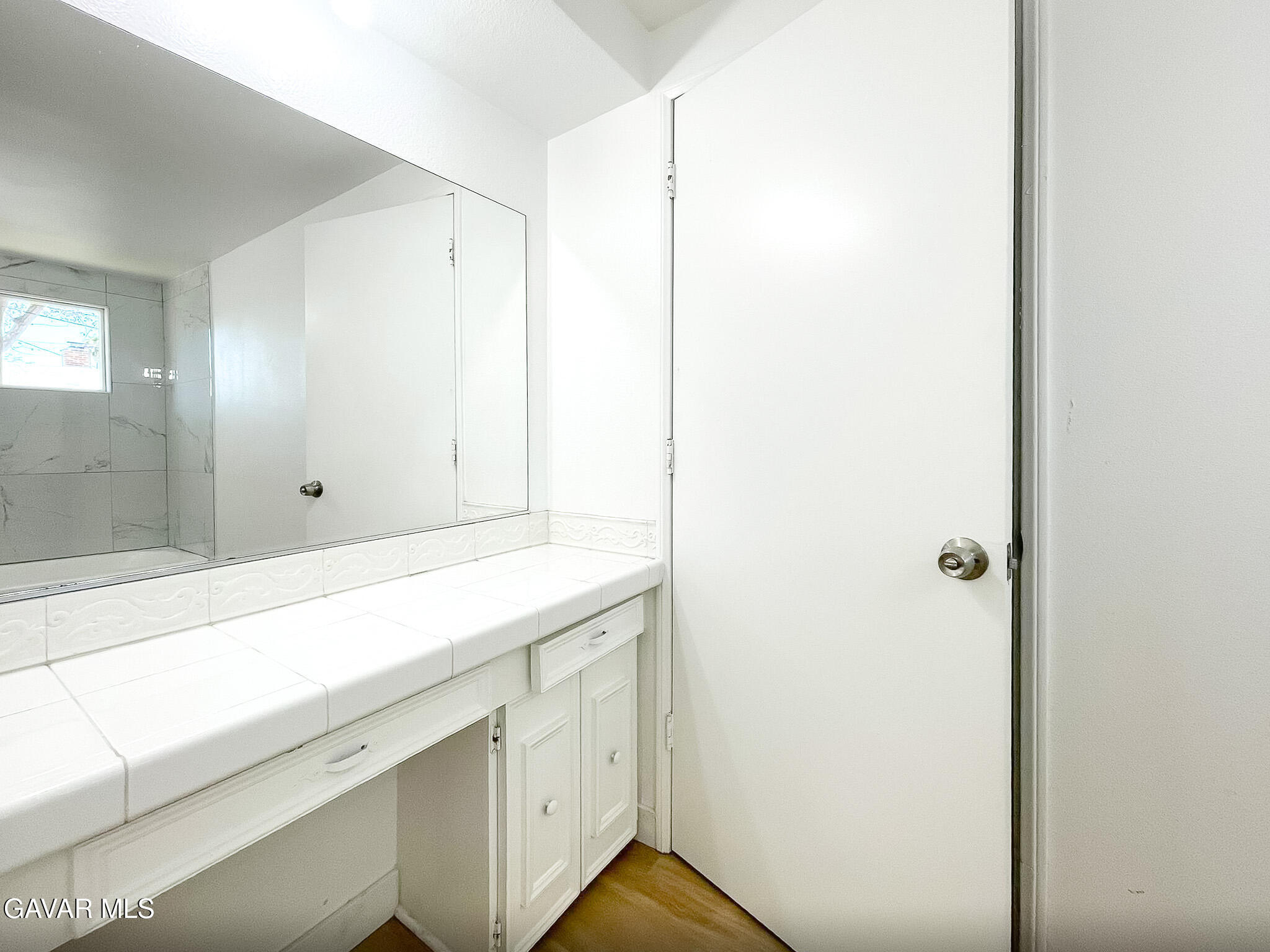 44739 3rd Street East Lancaster, CA 93535 - Photo 14 of 24 a room with cabinets