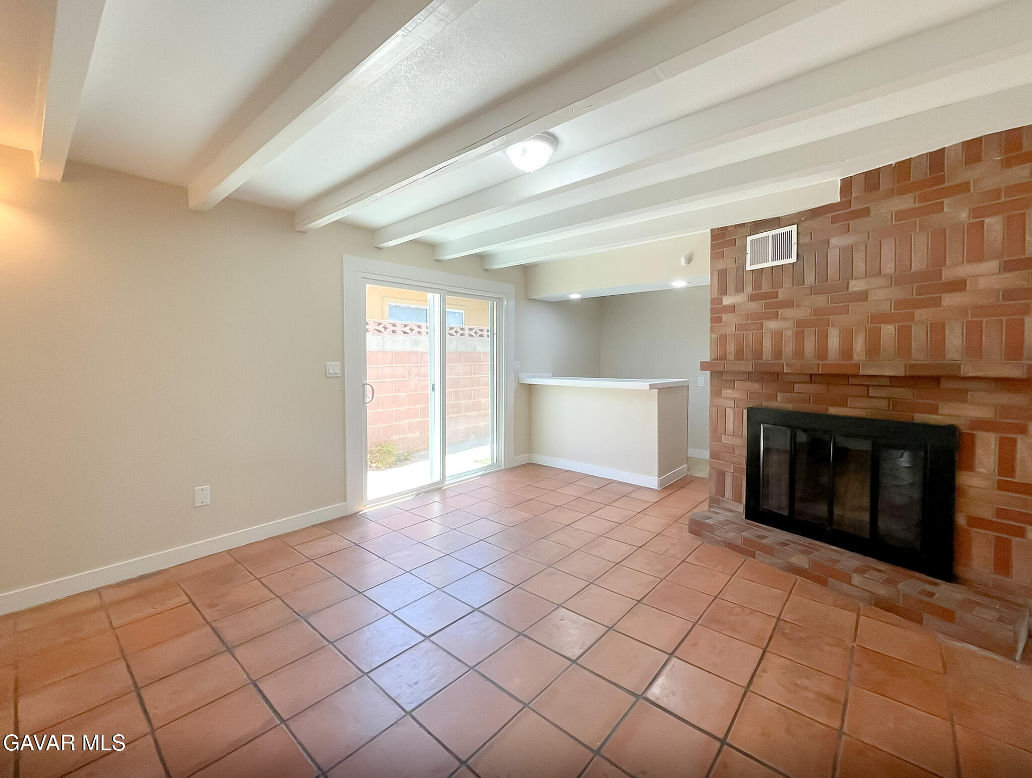 44739 3rd Street East Lancaster, CA 93535 - Photo 19 of 24 a view of an empty room with window and fire place