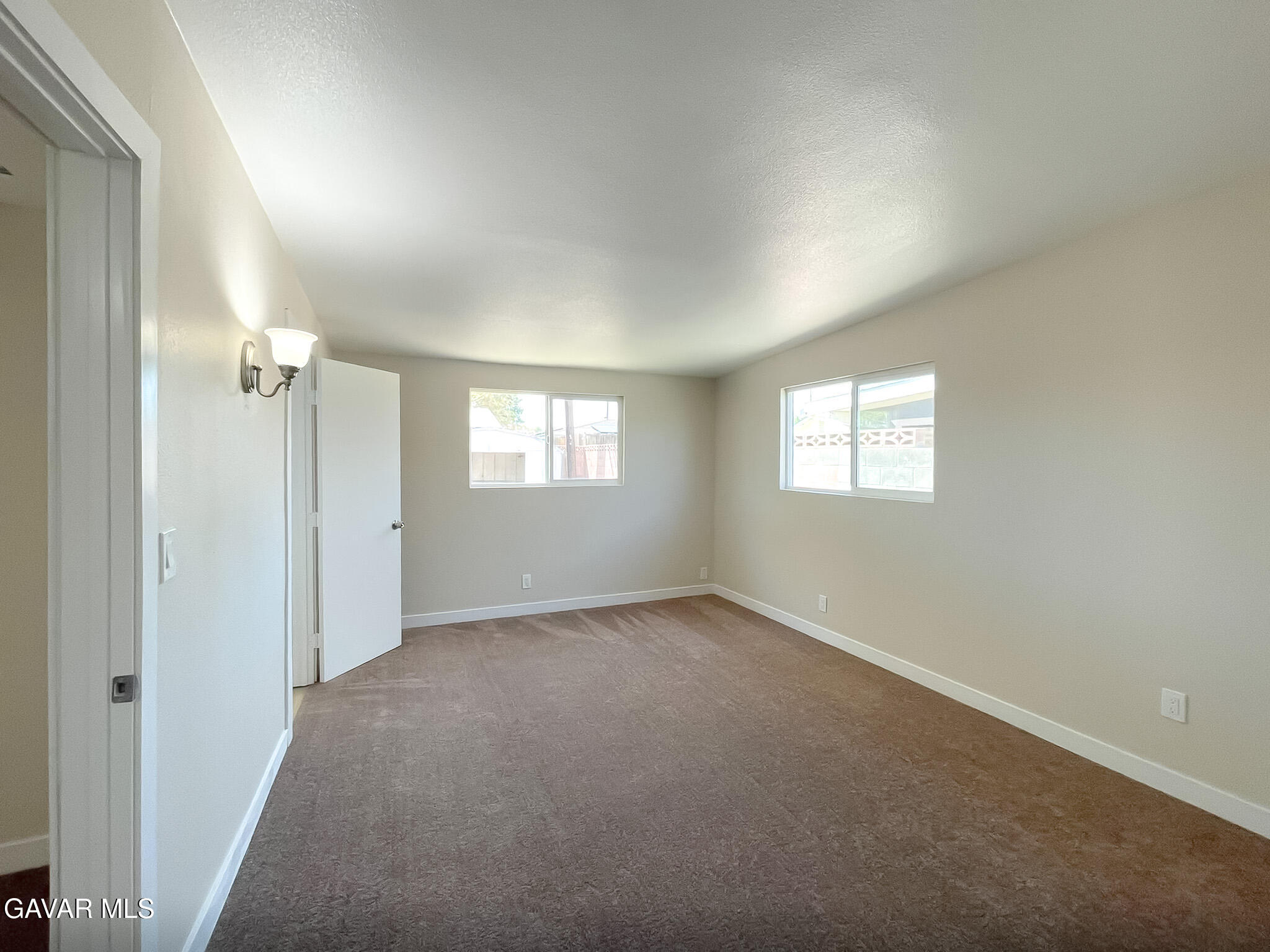 44739 3rd Street East Lancaster, CA 93535 - Photo 23 of 24 a view of an empty room with a window