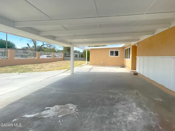 a view of an empty room with a sliding door