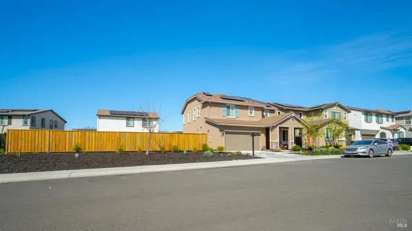 a view of a street with houses