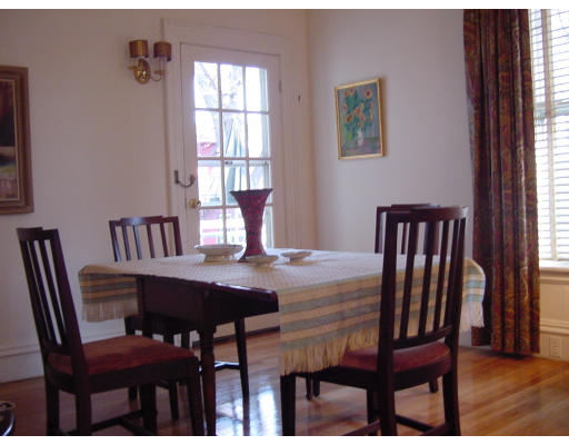 101 Upland Road Cambridge, MA 02140 - Photo 4 of 4 a view of a dining room with furniture and window