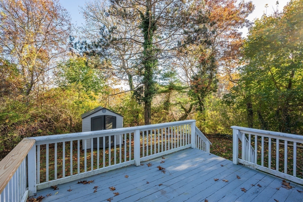 78 Puritan Road Bourne, MA 02532 - Photo 21 of 34 a view of a wooden roof deck