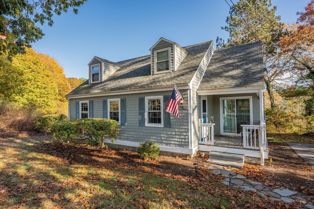 78 Puritan Road Bourne, MA 02532 - Photo 34 of 34 front view of a house with a yard