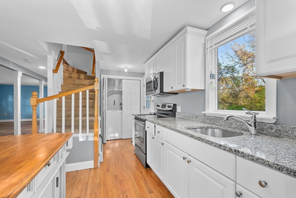 78 Puritan Road Bourne, MA 02532 - Photo 6 of 34 a kitchen with stainless steel appliances granite countertop a sink stove and cabinets