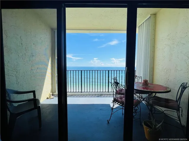 a bed room with a bed and a window