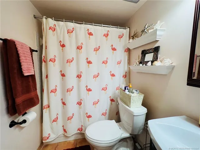 a view of a swimming pool with an outdoor seating