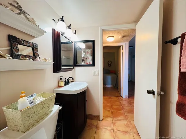 a view of outdoor space with wooden floor