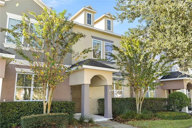 front view of a house with a garden
