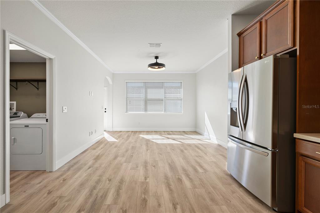 7819 Hardenton Street Windermere, FL 34786 - Photo 11 of 48 a view of empty room with wooden floor and fan