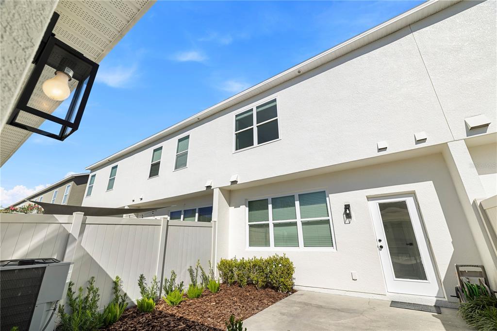 7819 Hardenton Street Windermere, FL 34786 - Photo 24 of 48 a front view of a house with a window