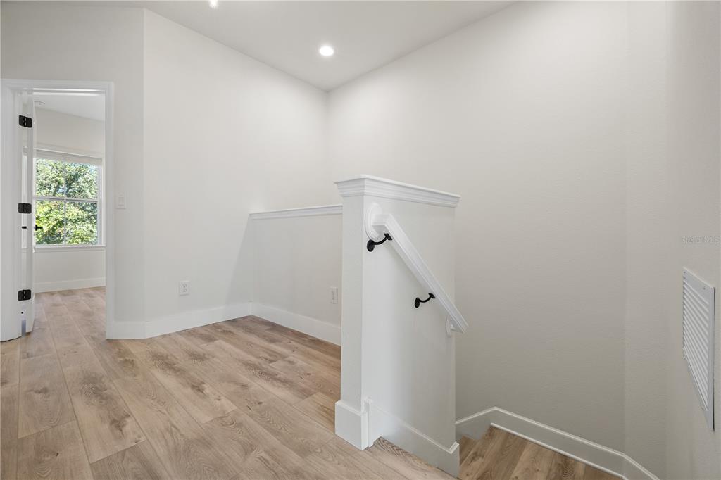 7819 Hardenton Street Windermere, FL 34786 - Photo 28 of 48 wooden floor in an empty room