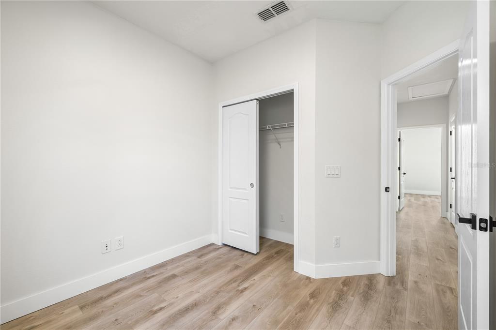 7819 Hardenton Street Windermere, FL 34786 - Photo 33 of 48 a view of a room with wooden floor