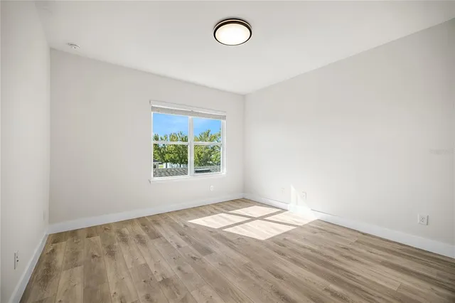 a view of a livingroom with wooden floor