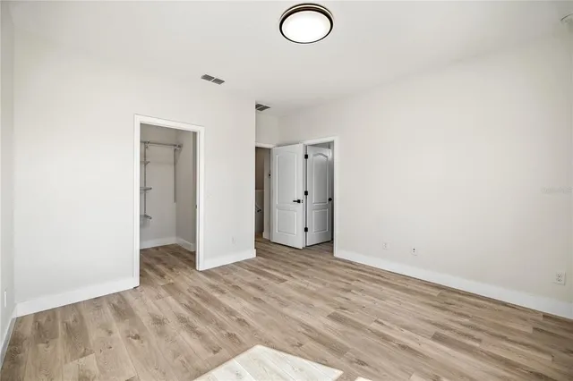 a view of a room with racks on the wall