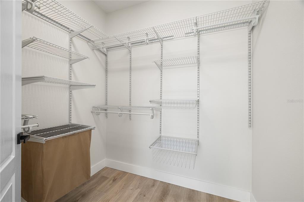 7819 Hardenton Street Windermere, FL 34786 - Photo 39 of 48 a view of a room with racks on the wall