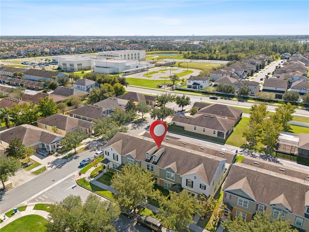 7819 Hardenton Street Windermere, FL 34786 - Photo 42 of 48 an aerial view of a residential building with swimming pool and outdoor space