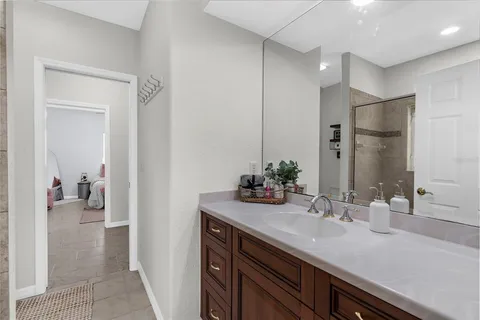 a bathroom with a sink and a mirror