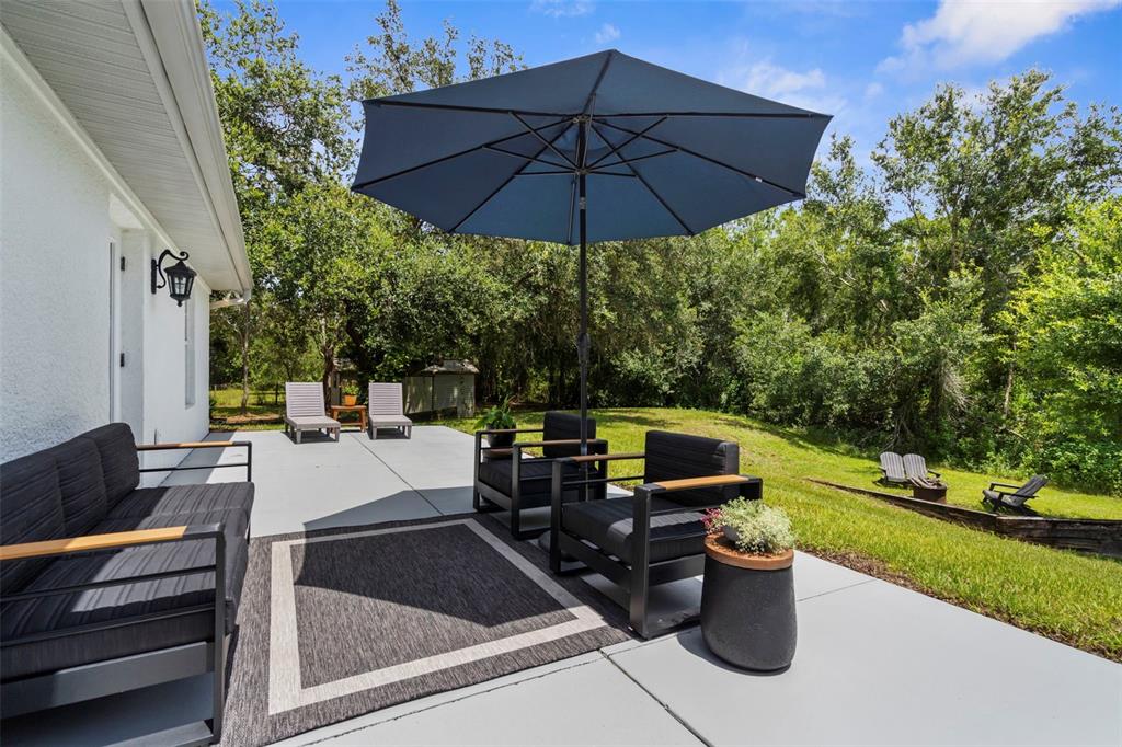 18355 Highway 62 Parrish, FL 34219 - Photo 36 of 50 a table and chairs in the patio
