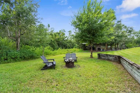 a garden with wooden fence