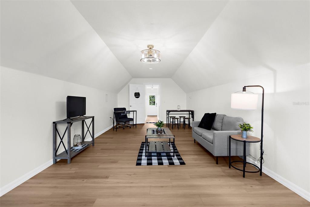 18355 Highway 62 Parrish, FL 34219 - Photo 44 of 50 a living room with furniture and a flat screen tv