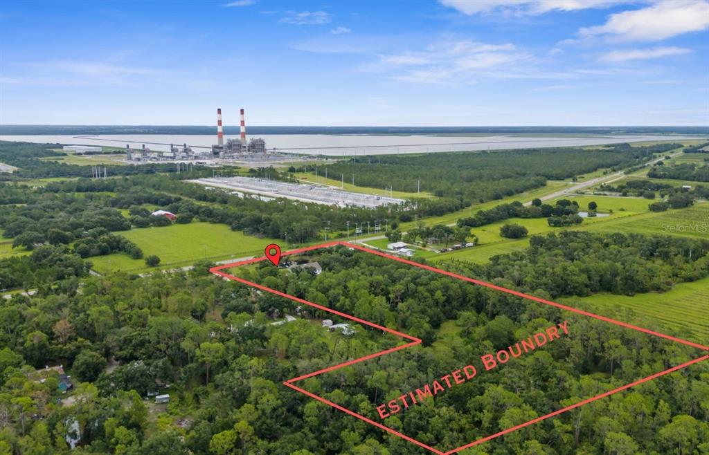 18355 Highway 62 Parrish, FL 34219 - Photo 49 of 50 a view of a city with flower on both side of it