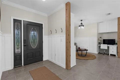 a view of livingroom with furniture and closet