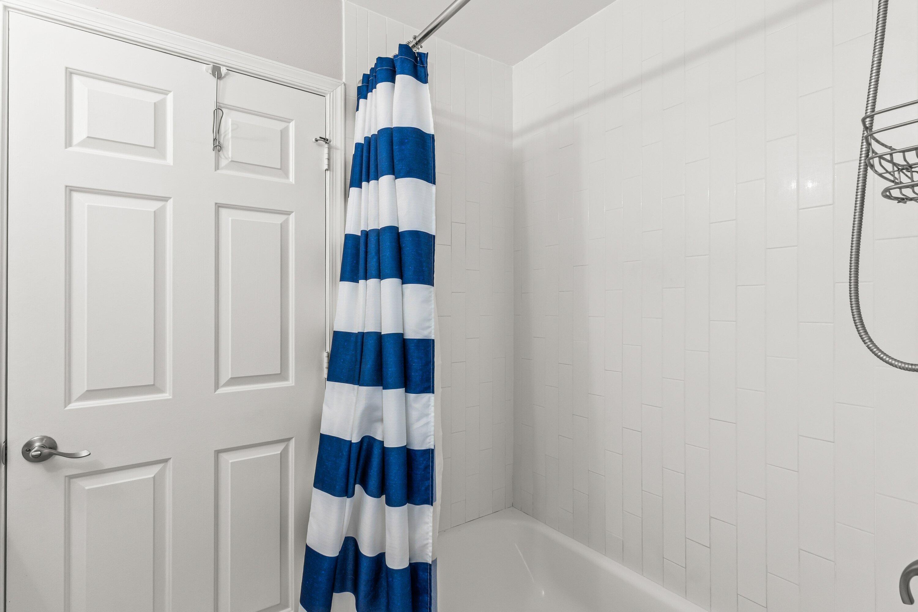 13795 Geranium Place Wellington, FL 33414 - Photo 15 of 37 a bathroom with a shower and a bathtub