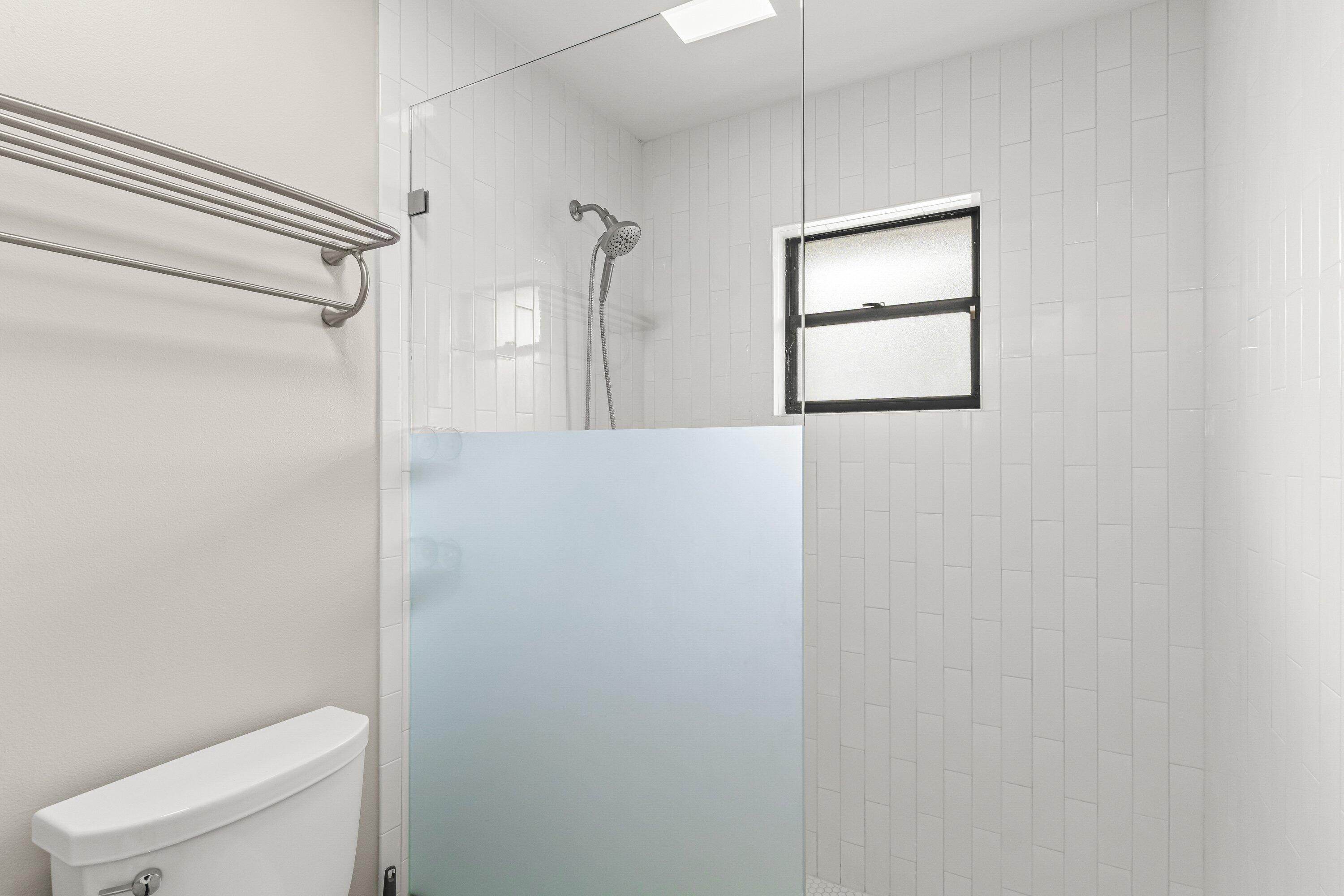 13795 Geranium Place Wellington, FL 33414 - Photo 21 of 37 a bathroom with a toilet and a shower