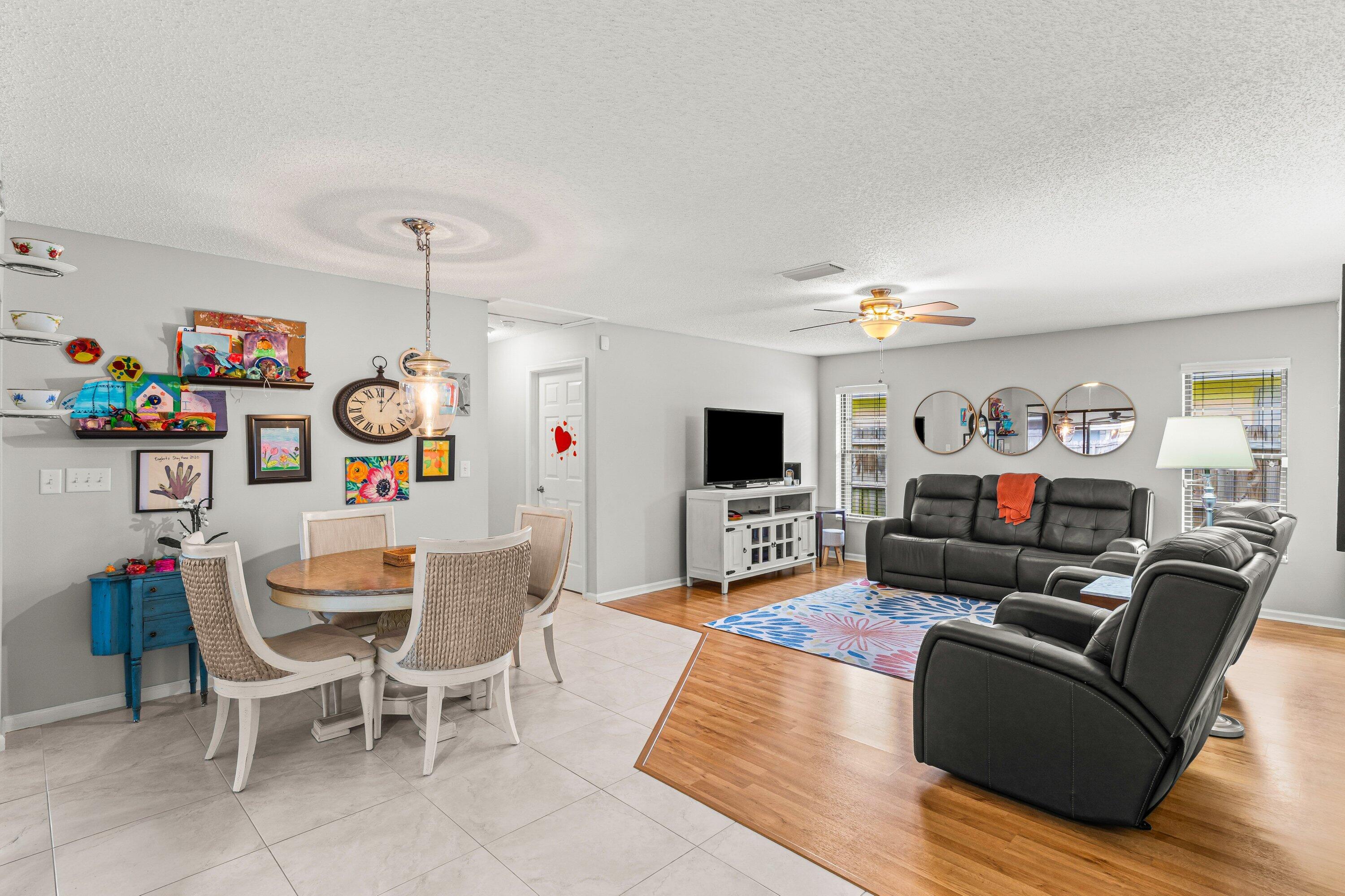 13795 Geranium Place Wellington, FL 33414 - Photo 3 of 37 a living room with furniture and a flat screen tv