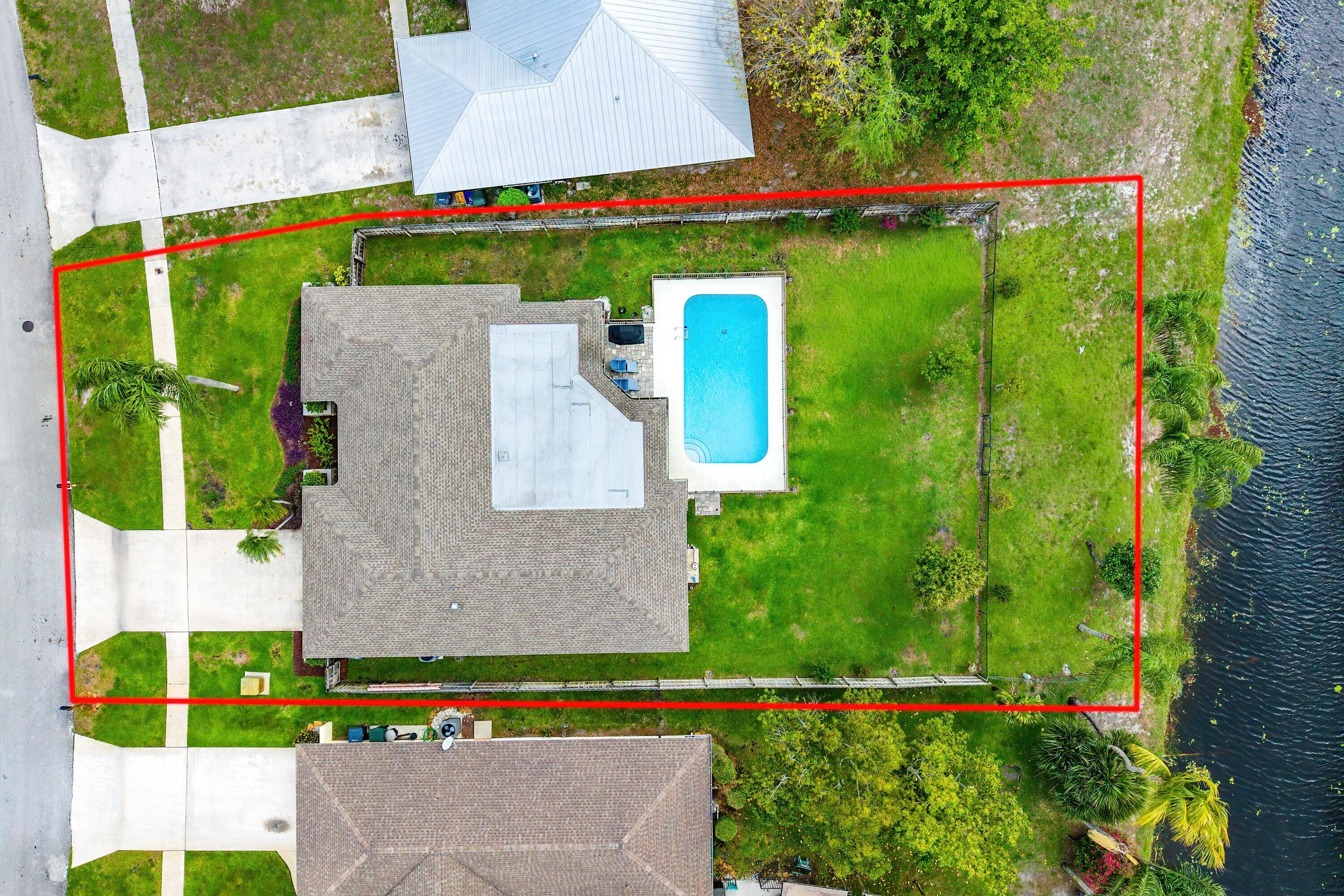 13795 Geranium Place Wellington, FL 33414 - Photo 36 of 37 an aerial view of a house