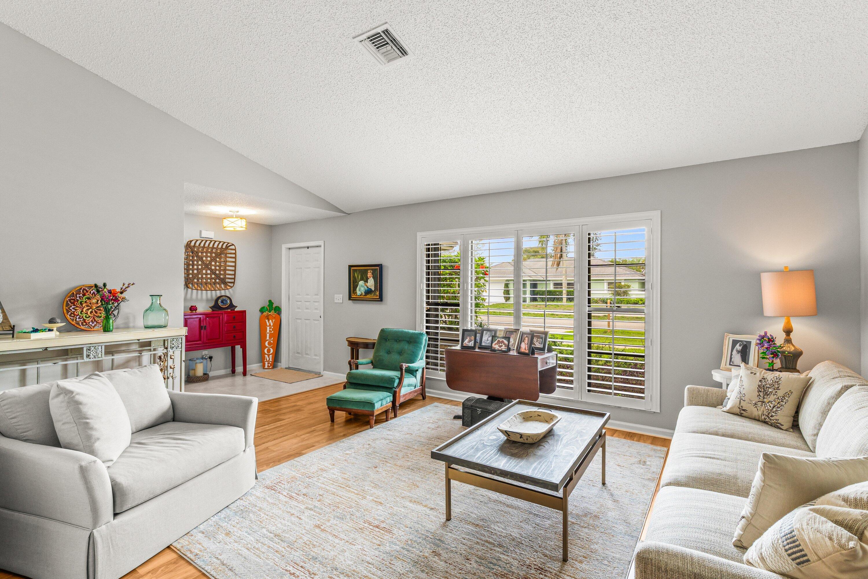 13795 Geranium Place Wellington, FL 33414 - Photo 6 of 37 a living room with furniture and a window