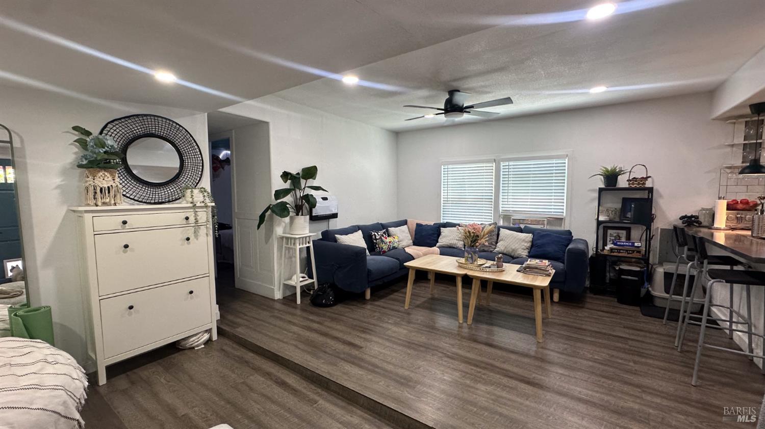 4532 Pine Street Lucerne, CA 95458 - Photo 11 of 34 a living room with furniture a flat screen tv and a window