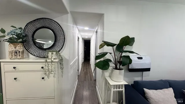 a bathroom with a sink mirror and vanity