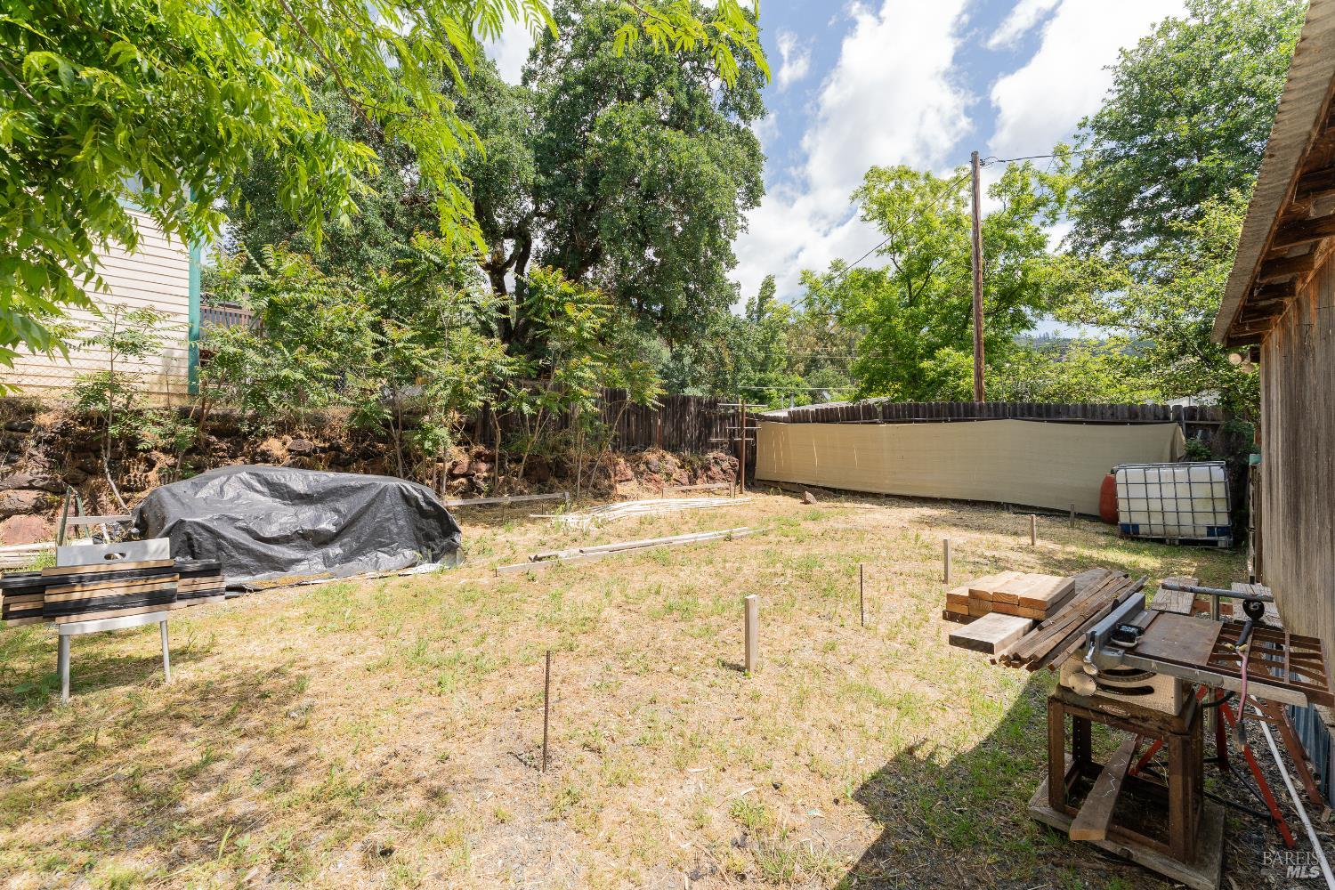 4532 Pine Street Lucerne, CA 95458 - Photo 26 of 34 a view of swimming pool with lawn chairs under an umbrella