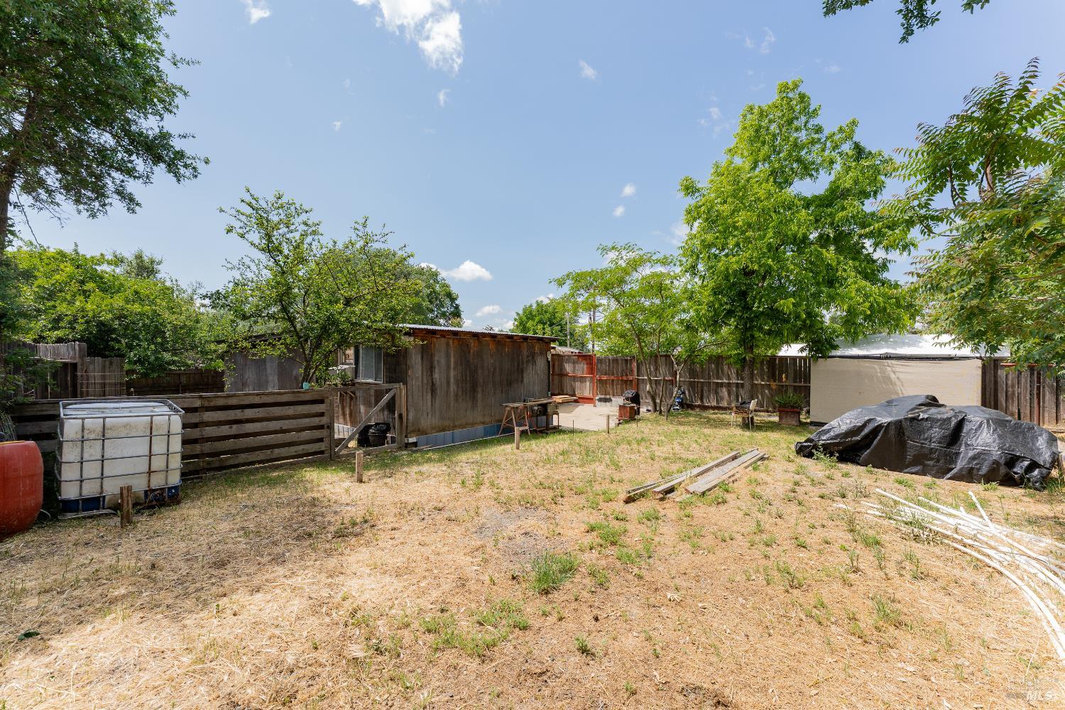 4532 Pine Street Lucerne, CA 95458 - Photo 29 of 34 a backyard of a house with seating space