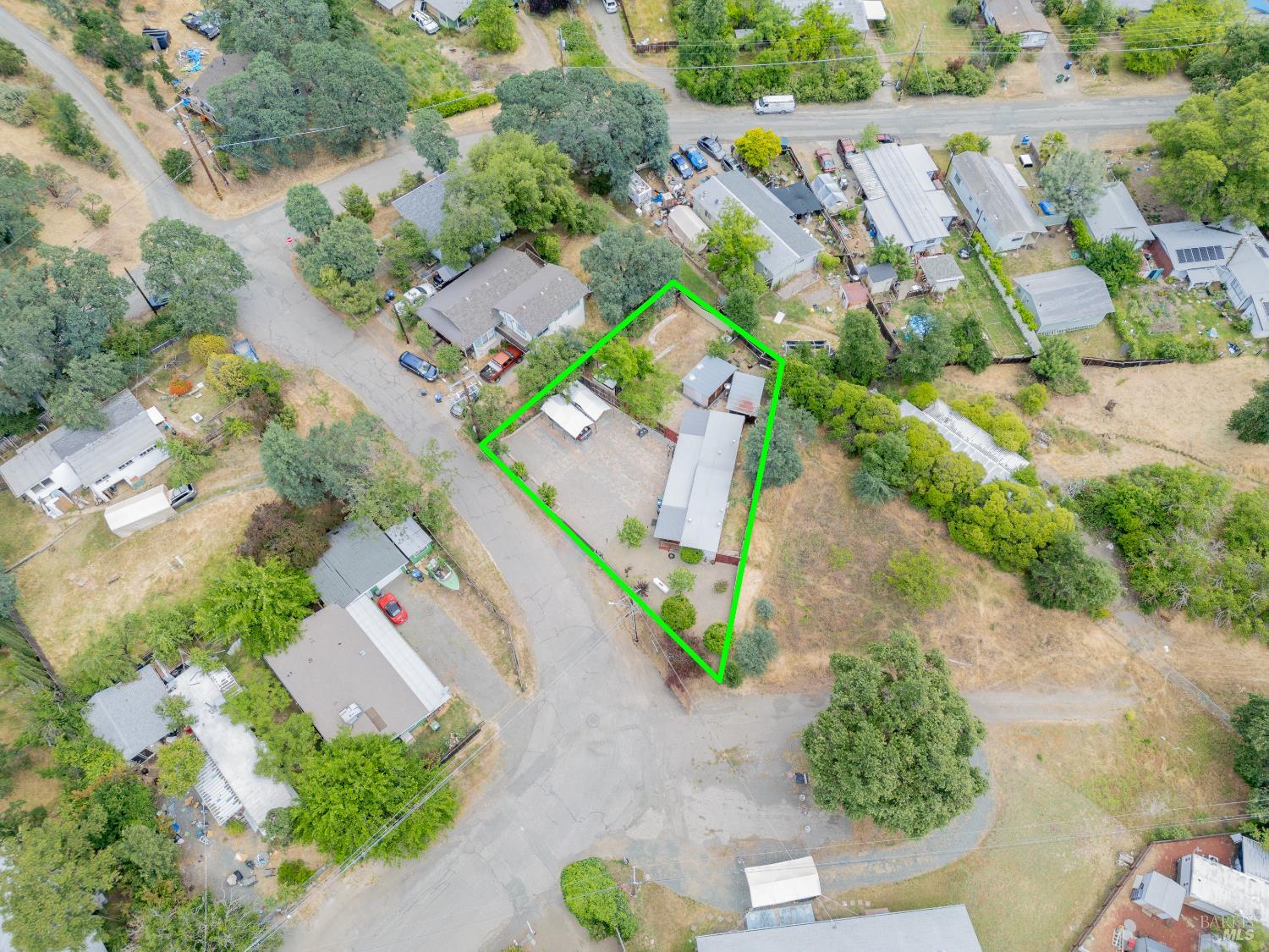 4532 Pine Street Lucerne, CA 95458 - Photo 33 of 34 an aerial view of a house with a yard and garden