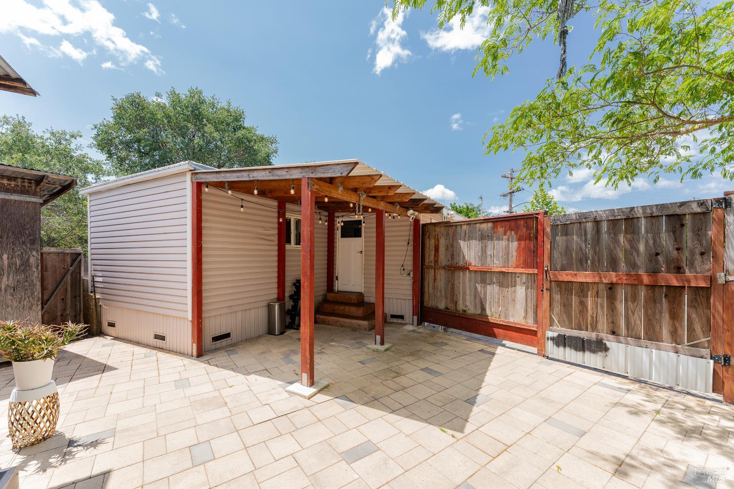 4532 Pine Street Lucerne, CA 95458 - Photo 6 of 34 a view of a house with a backyard and a patio
