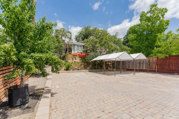 a view of front door of a house with a porch