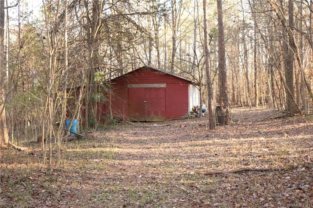 14475 Cabarrus Station Road Midland, NC 28107 - Photo 3 of 23 a view of a backyard of the house