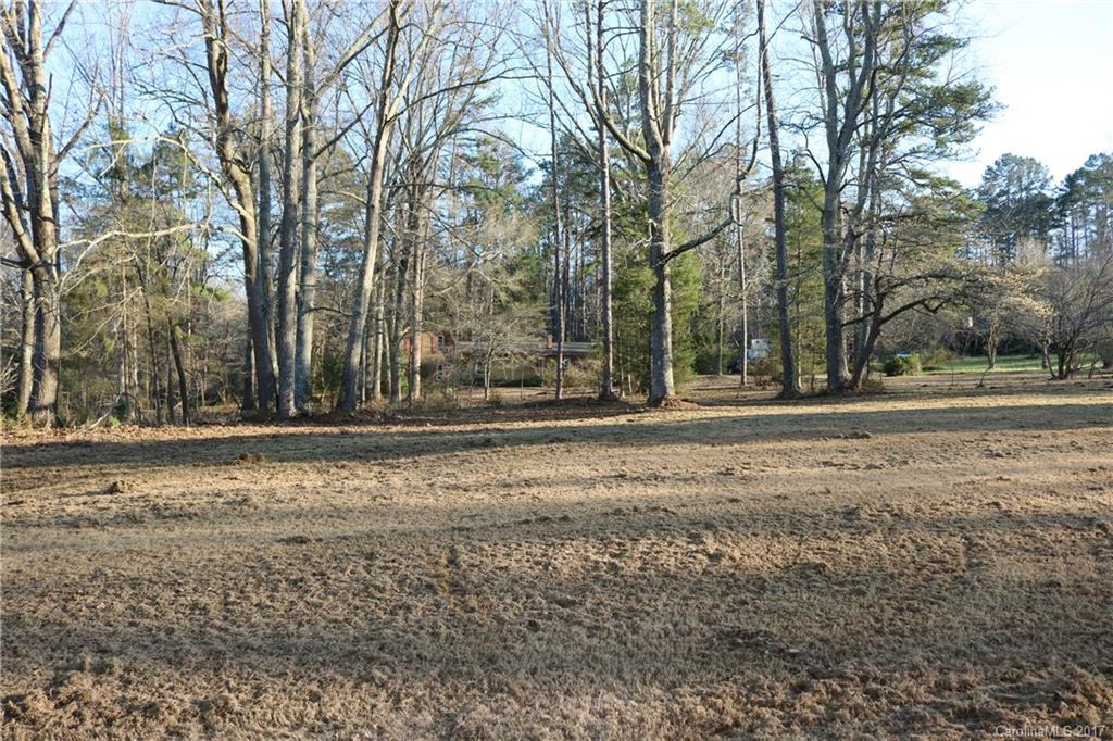 14475 Cabarrus Station Road Midland, NC 28107 - Photo 21 of 23 a view of dirt yard with large trees