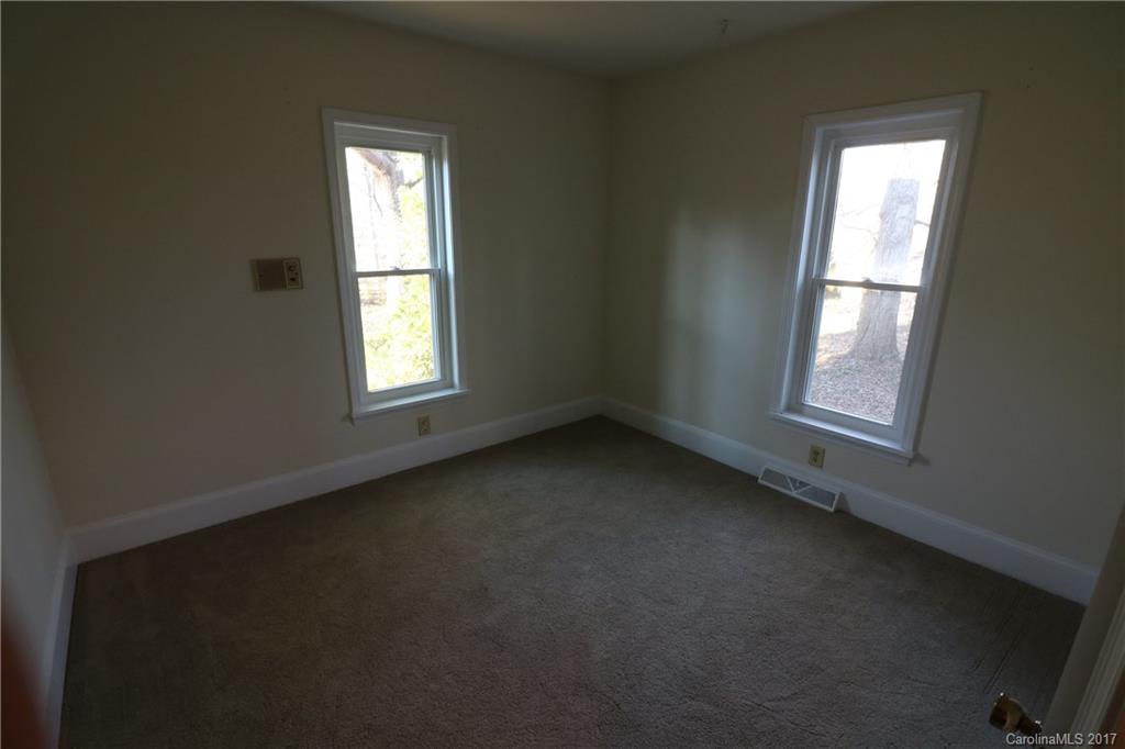 14475 Cabarrus Station Road Midland, NC 28107 - Photo 10 of 23 an empty room with a window