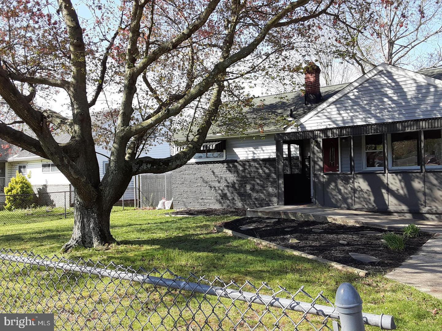 209 Baldwin Road Glassboro, NJ 08028 - Photo 2 of 10 a view of a house with a yard