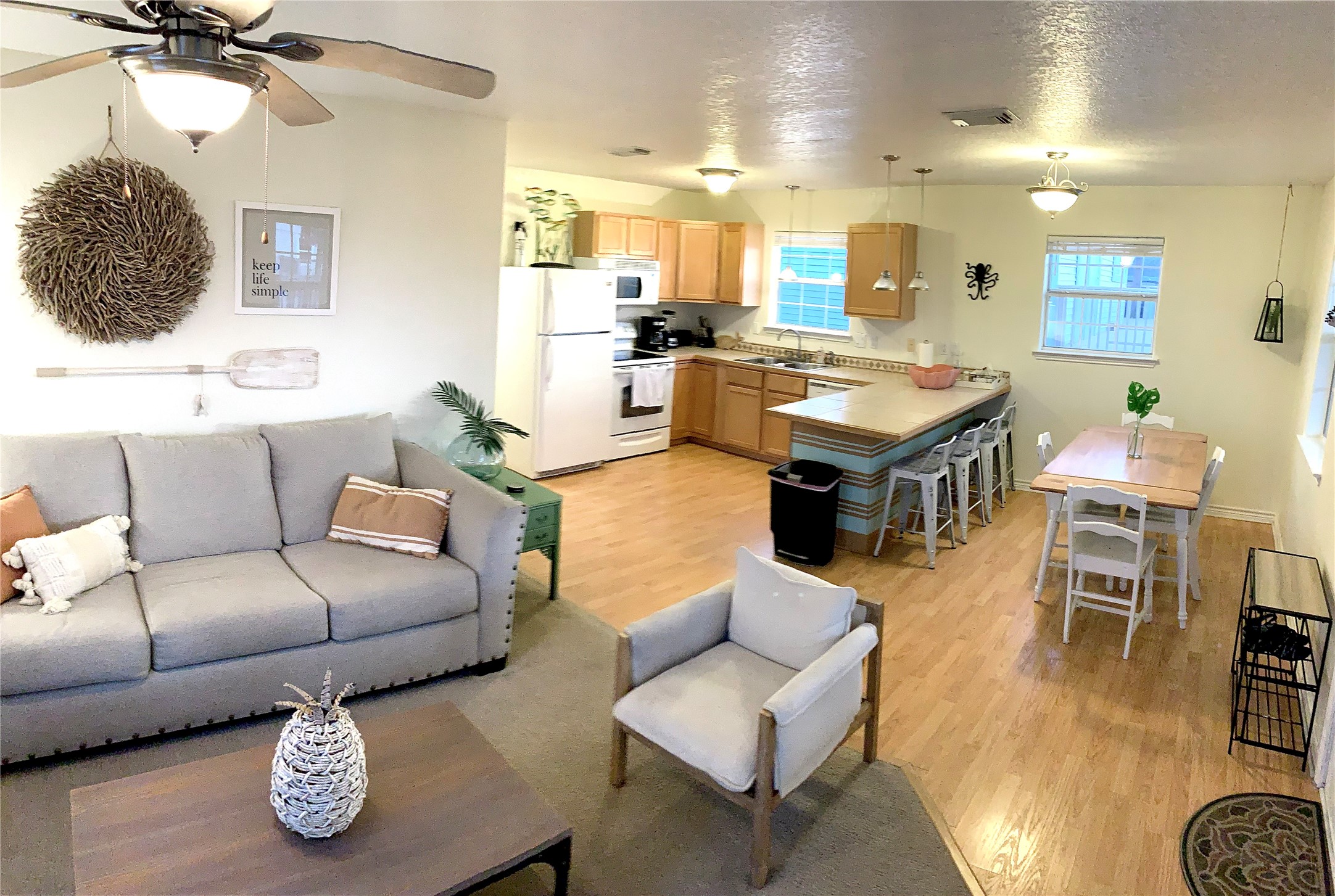 215 Pompano Lane Surfside Beach, TX 77541 - Photo 3 of 8 a living room with furniture and kitchen view