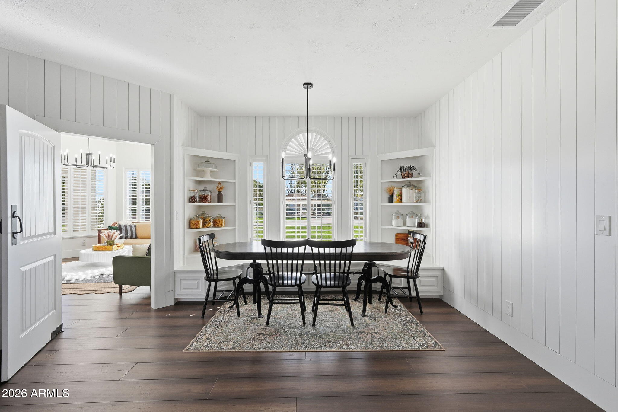 4222 East McLellan Road, Unit 15 Mesa, AZ 85205 - Photo 24 of 86 a view of a dining room with furniture window and wooden floor